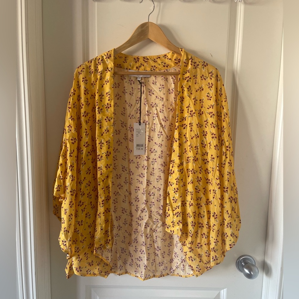Designers Society Shrug. Size small. Belled sleeves.